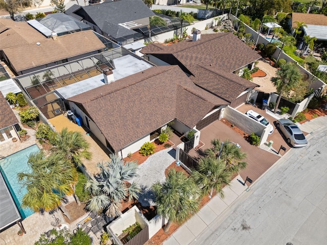 birds eye view of property with a residential view