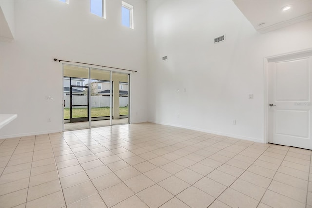 unfurnished room with light tile patterned floors, recessed lighting, visible vents, and baseboards