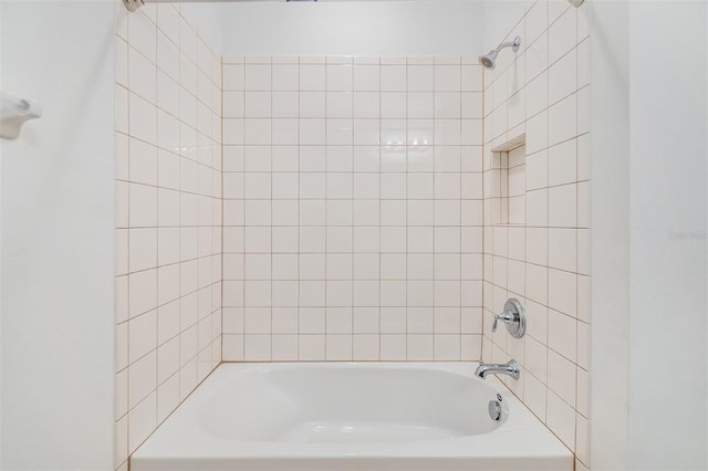 bathroom with shower / bath combination