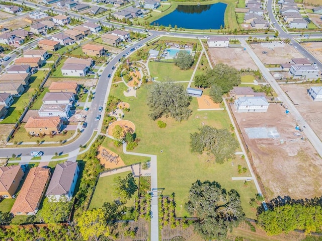 birds eye view of property featuring a residential view and a water view