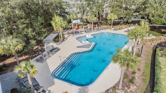 community pool with a patio area