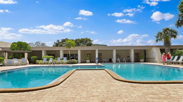 pool featuring a patio area