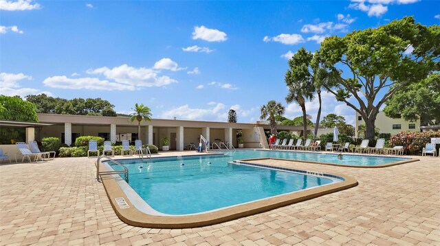 pool featuring a patio area