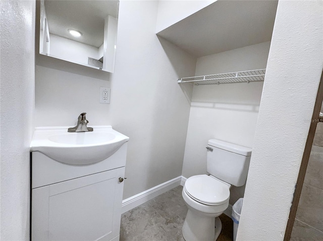 11201 Blendale Dr, Riverview, FL 33569 - half bathroom with toilet, baseboards, a closet, and vanity