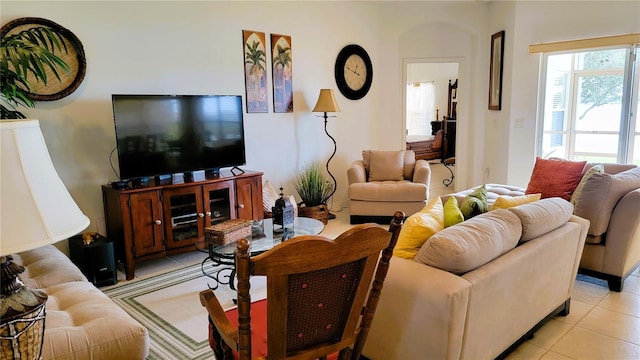 living room with light tile patterned flooring