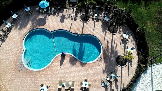 pool with a patio area