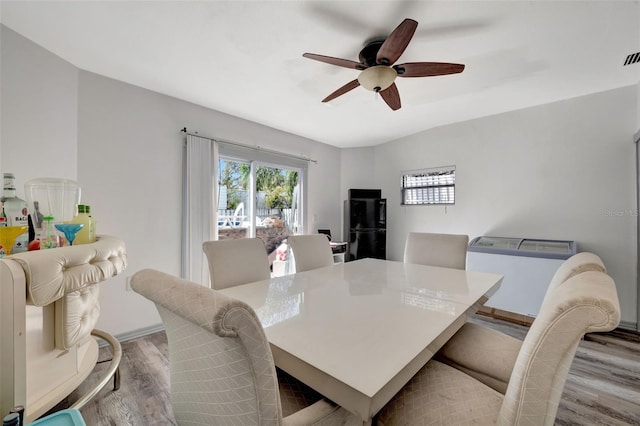 4716 Gazania St, New Port Richey, FL 34652 - dining room with ceiling fan and wood finished floors