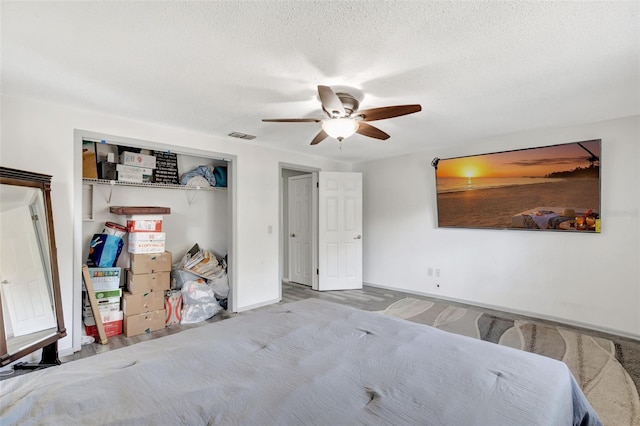 4716 Gazania St, New Port Richey, FL 34652 - unfurnished bedroom featuring a closet, visible vents, ceiling fan, a textured ceiling, and baseboards