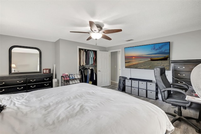 4716 Gazania St, New Port Richey, FL 34652 - bedroom featuring ceiling fan, a closet, visible vents, and wood finished floors