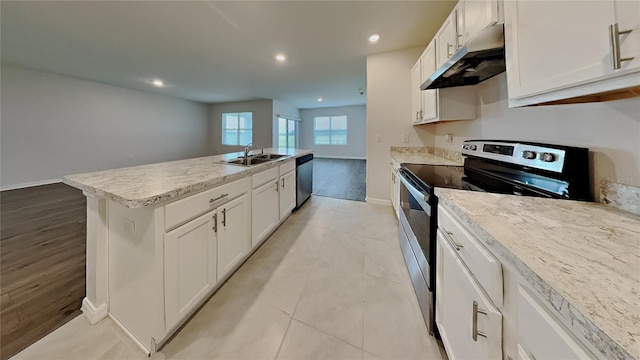 kitchen with under cabinet range hood, white cabinetry, and stainless steel appliances