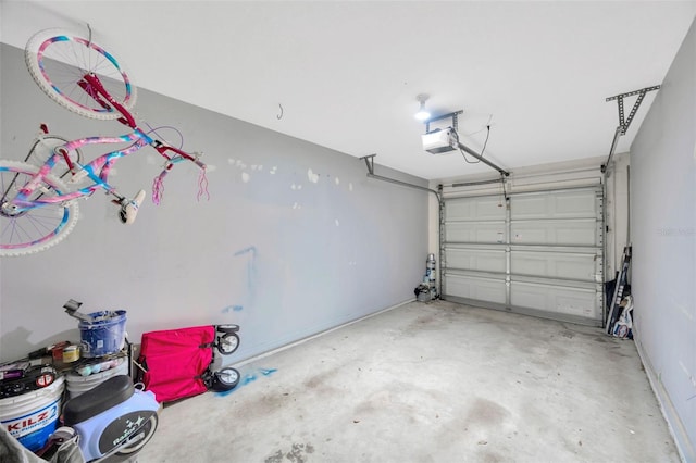 garage featuring a garage door opener