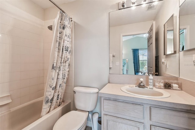 bathroom with shower / bath combination with curtain, visible vents, vanity, and toilet