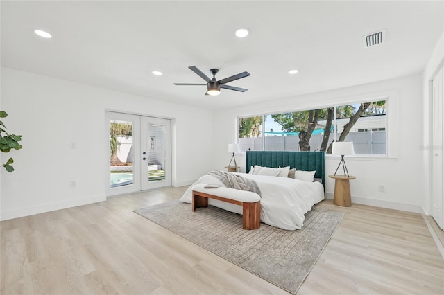 bedroom featuring light wood-style flooring, recessed lighting, baseboards, access to outside, and french doors