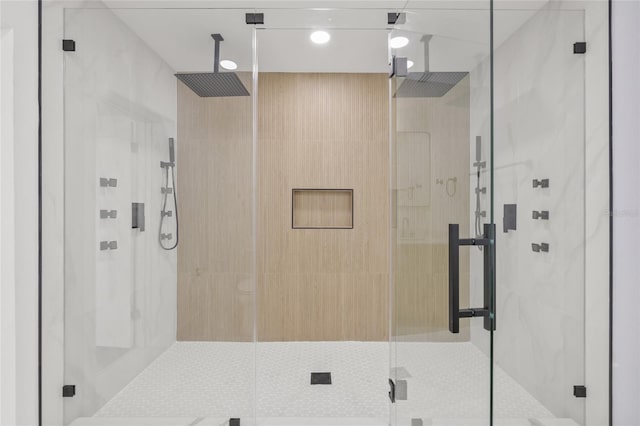 bathroom with a stall shower