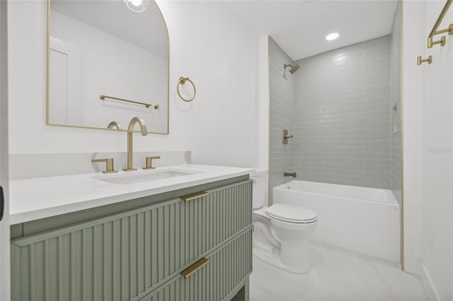 bathroom featuring shower / bath combination, vanity, and toilet