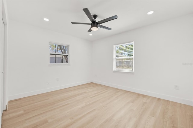 unfurnished room featuring light wood-style floors, recessed lighting, baseboards, and a ceiling fan