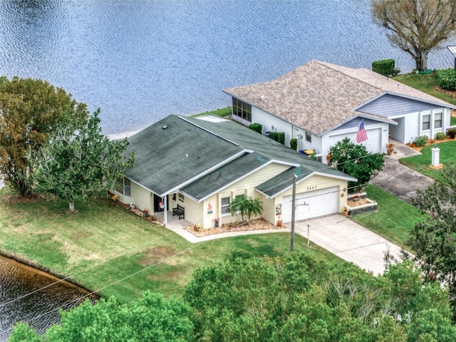 birds eye view of property featuring a water view