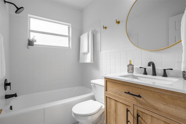 full bathroom featuring toilet, shower / washtub combination, tile walls, and vanity