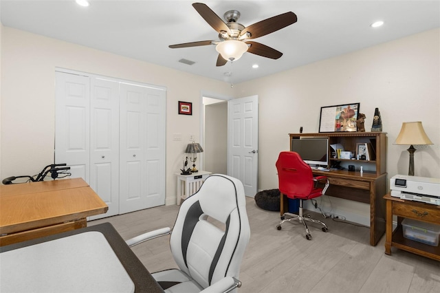 office area featuring recessed lighting, ceiling fan, and light wood-style flooring