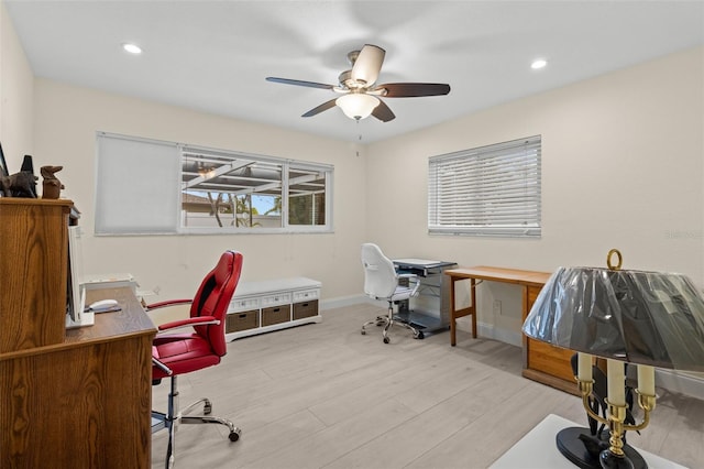 office area with a ceiling fan, light wood-type flooring, baseboards, and recessed lighting