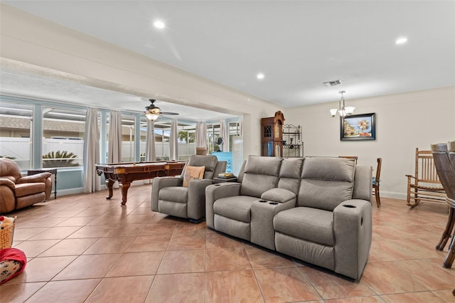 living room featuring light tile patterned flooring, visible vents, and recessed lighting