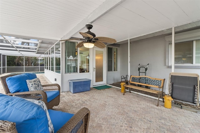 view of patio / terrace featuring ceiling fan, outdoor lounge area, and a lanai