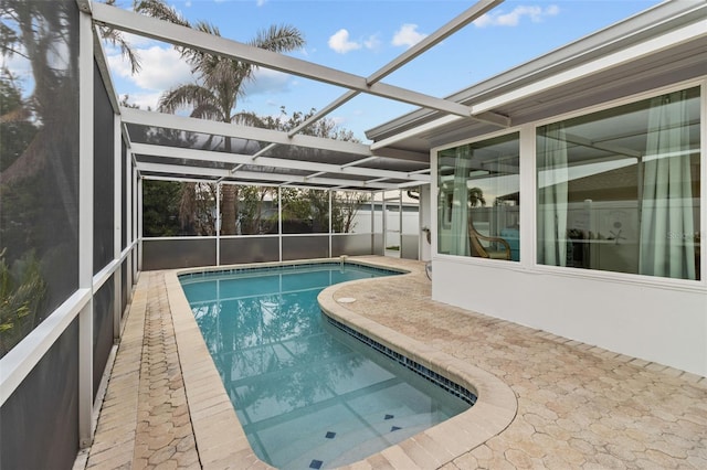 outdoor pool featuring a lanai