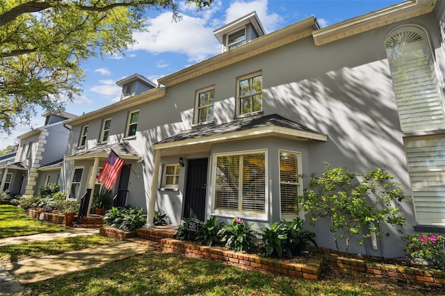 view of front of house with stucco siding