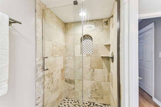 bathroom with a stall shower