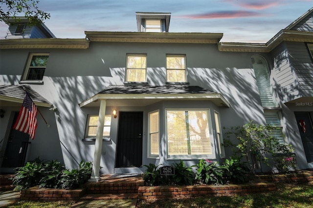 view of front of house with stucco siding