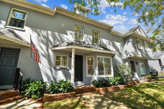 view of front of home with stucco siding