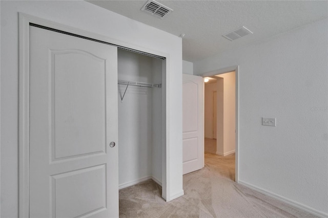 closet featuring visible vents