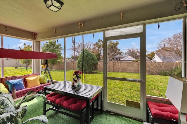 sunroom / solarium with a healthy amount of sunlight