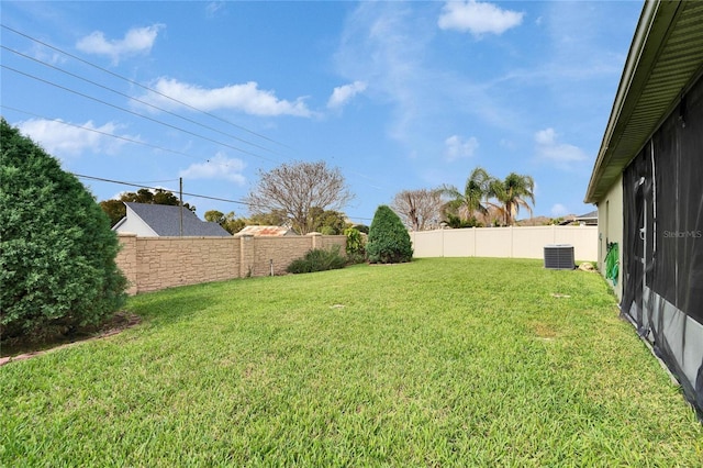 view of yard featuring a fenced backyard and cooling unit