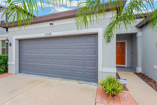 garage with driveway