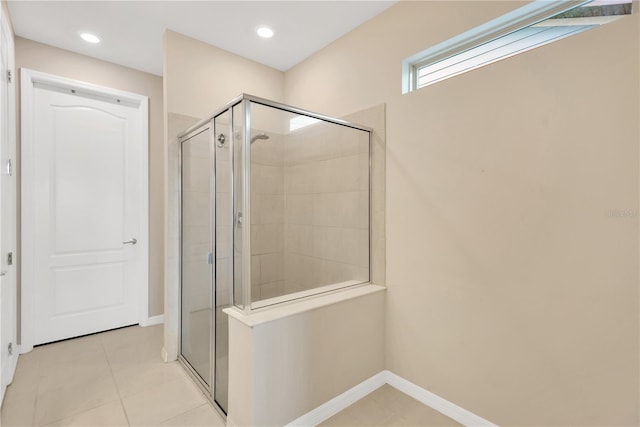 full bathroom with baseboards, tile patterned flooring, a shower stall, and recessed lighting