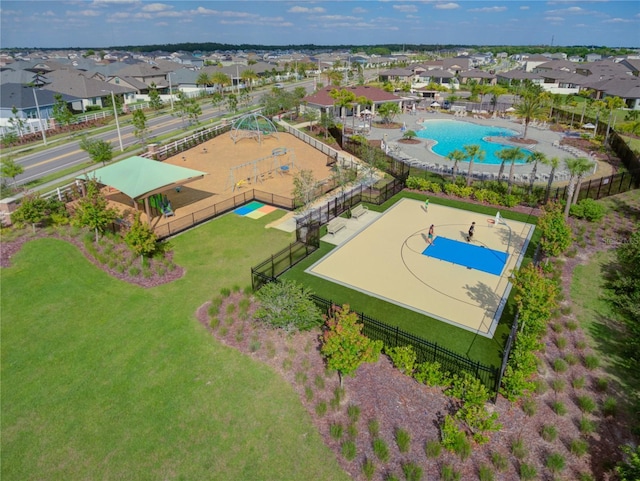 birds eye view of property with a residential view