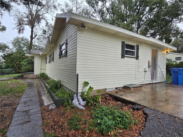 view of home's exterior with a patio