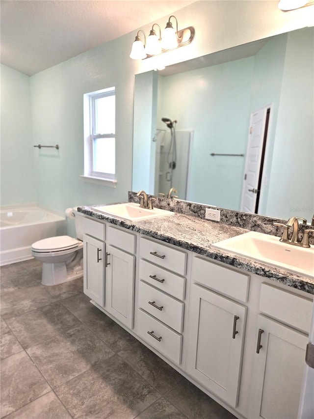 bathroom with a garden tub, a shower, a sink, and toilet