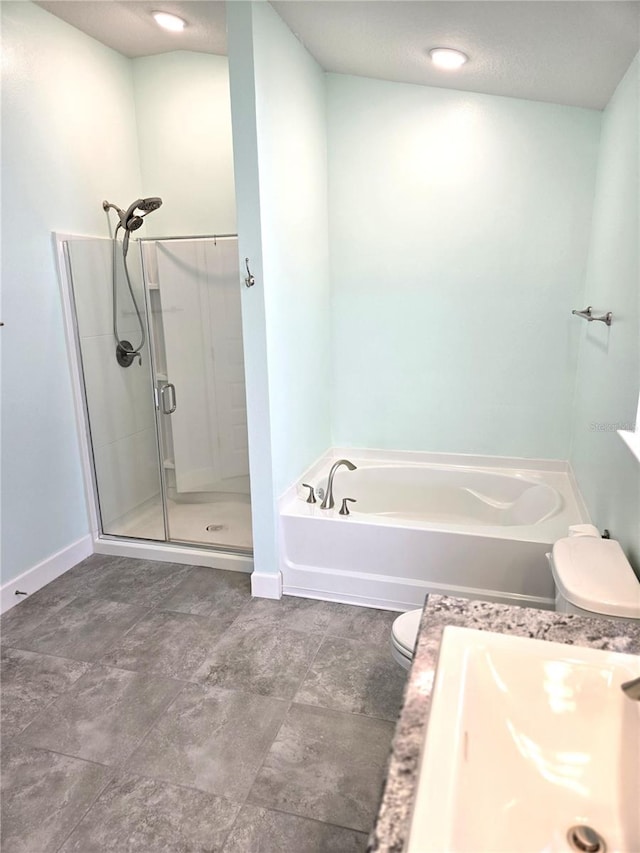 full bath featuring a garden tub, a shower stall, and baseboards