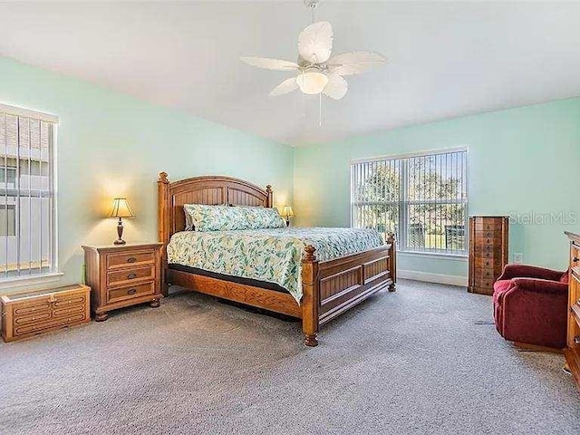 bedroom featuring carpet and a ceiling fan