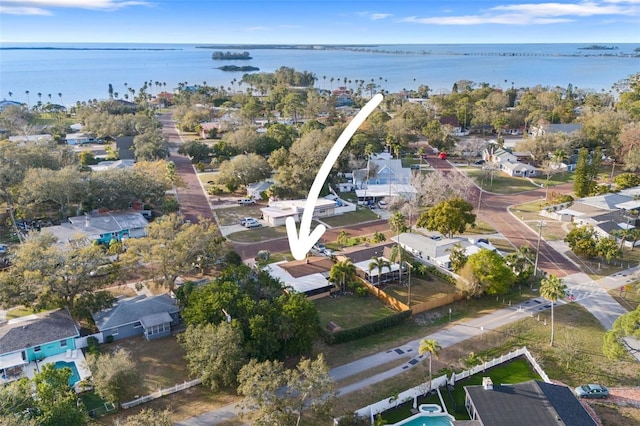 aerial view featuring a residential view and a water view