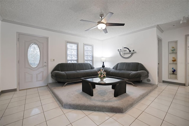 living area with light tile patterned flooring, crown molding, and a textured ceiling