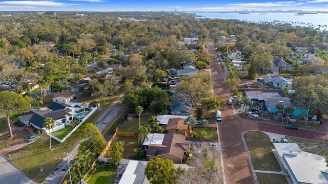 birds eye view of property featuring a water view and a residential view