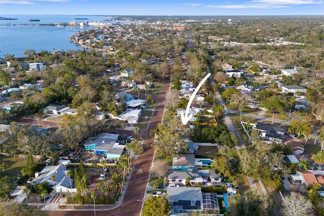 aerial view with a residential view and a water view