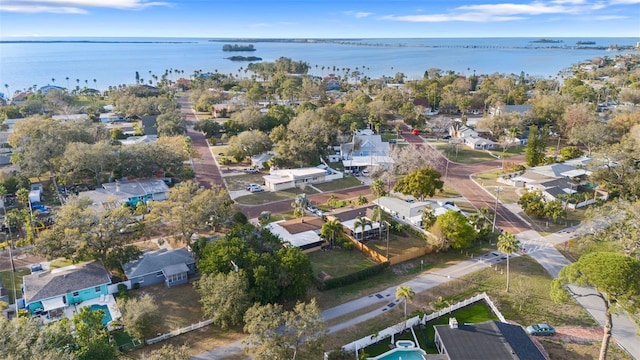 bird's eye view featuring a water view and a residential view