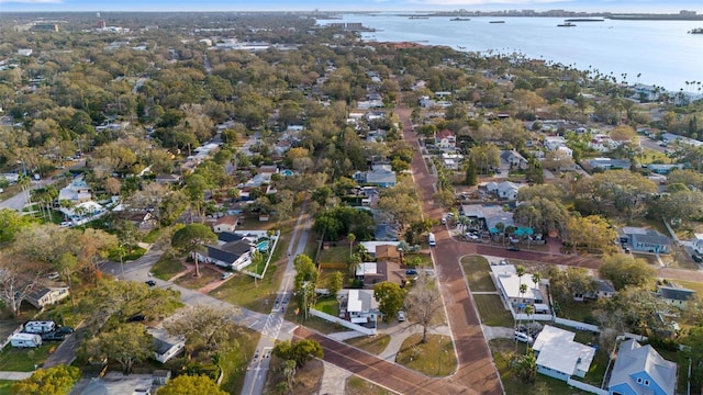 bird's eye view with a residential view and a water view