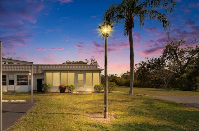 view of front of house with a lawn