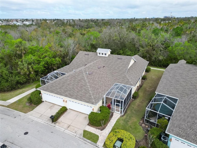 bird's eye view featuring a view of trees