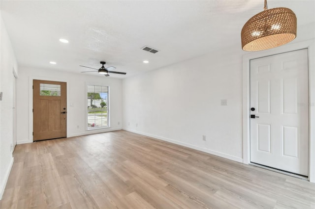 entrance foyer with light wood finished floors, recessed lighting, visible vents, and baseboards